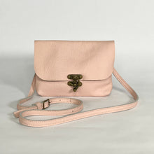 Load image into Gallery viewer, small pink leather crossbody bag with antique brass swing clasp