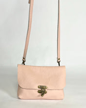 Load image into Gallery viewer, pink leather purse with crossbody strap and antique brass front clasp