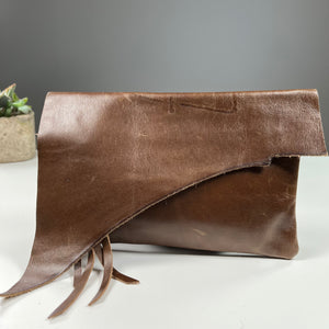 Raw Edge Clutch in chocolate brown leather handmade by Marge and Rudy