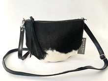 Load image into Gallery viewer, Handcrafted leather hair on hide crossbody bag in black and white spotted cowhide