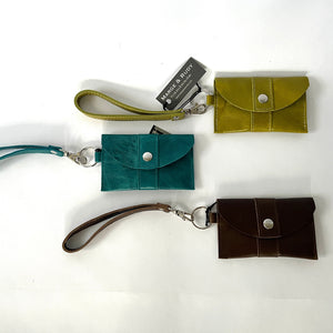 Handcrafted genuine leather keychain wallet with wristlet strap in green, turquoise and brown.