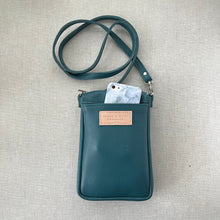 Load image into Gallery viewer, Handmade leather crossbody bag with back phone pocket in teal leather made to order in Charlotte NC by Marge and Rudy