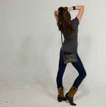 Load image into Gallery viewer, Girl wearing a RRR cross body bag by Marge and Rudy on her hip